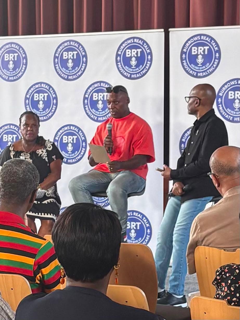 The panel: Sandra, Tony in a red T-shirt holding a microphone, and Patrick Burrows.