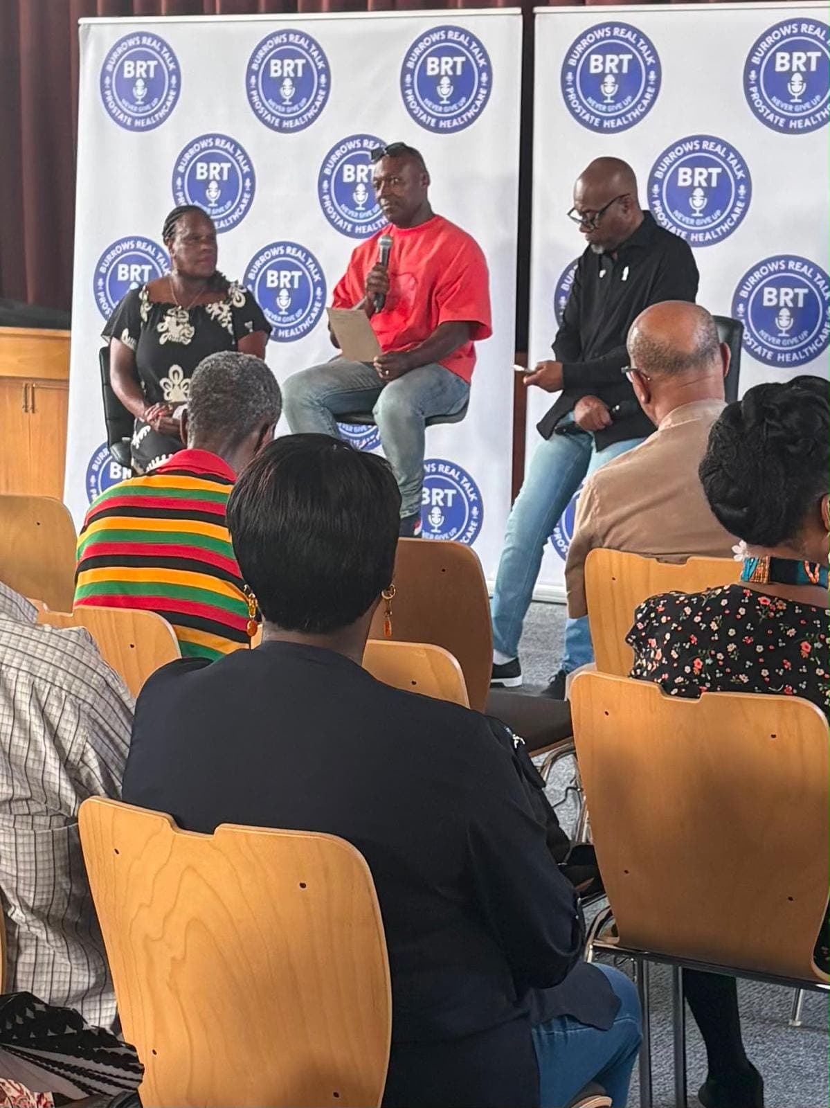 A wider view of the panel with Tony, Sandra and Patrick Burrows.